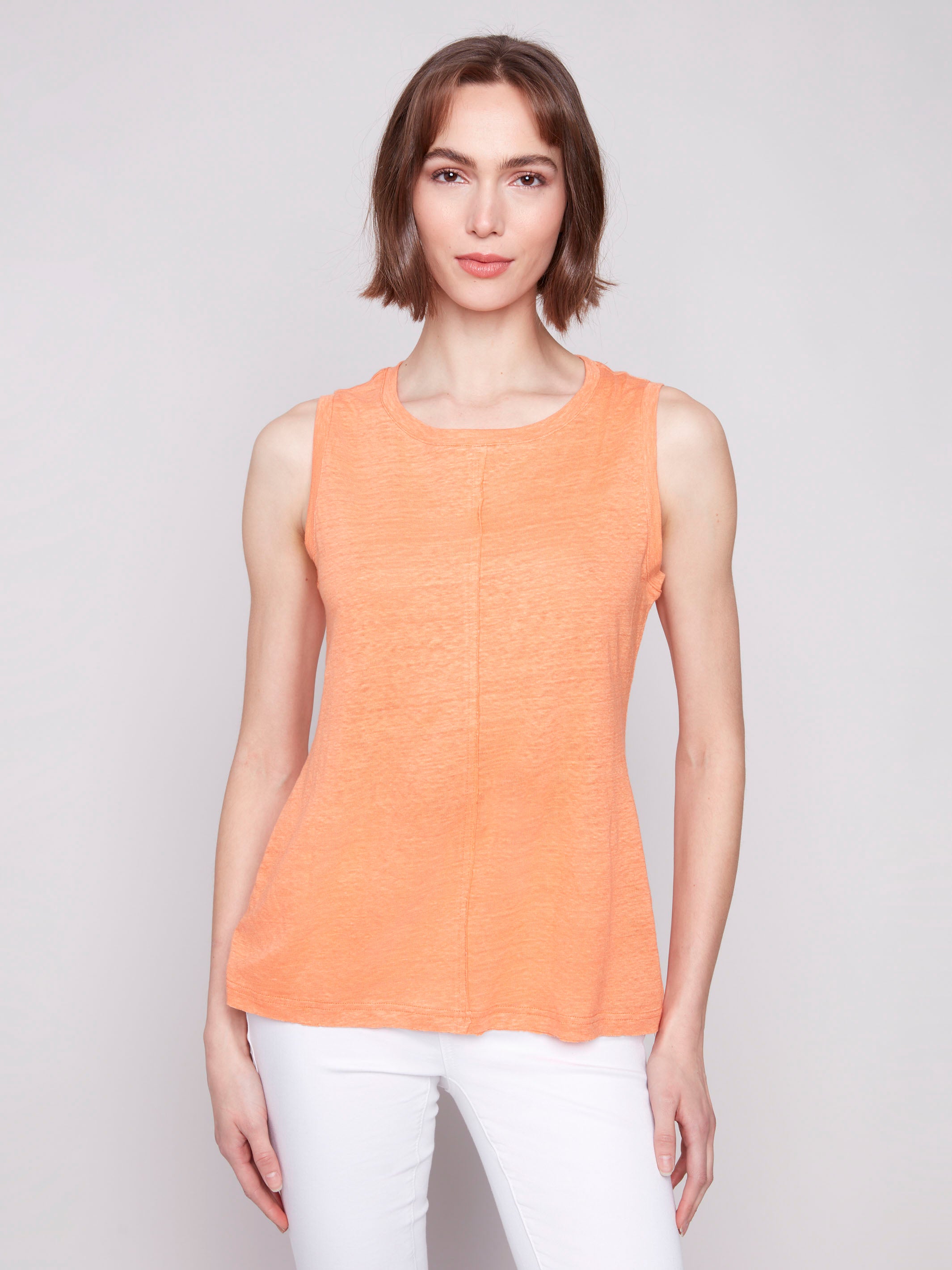 Papaya sleeveless top with a stylish crew neckline by Charlie B.