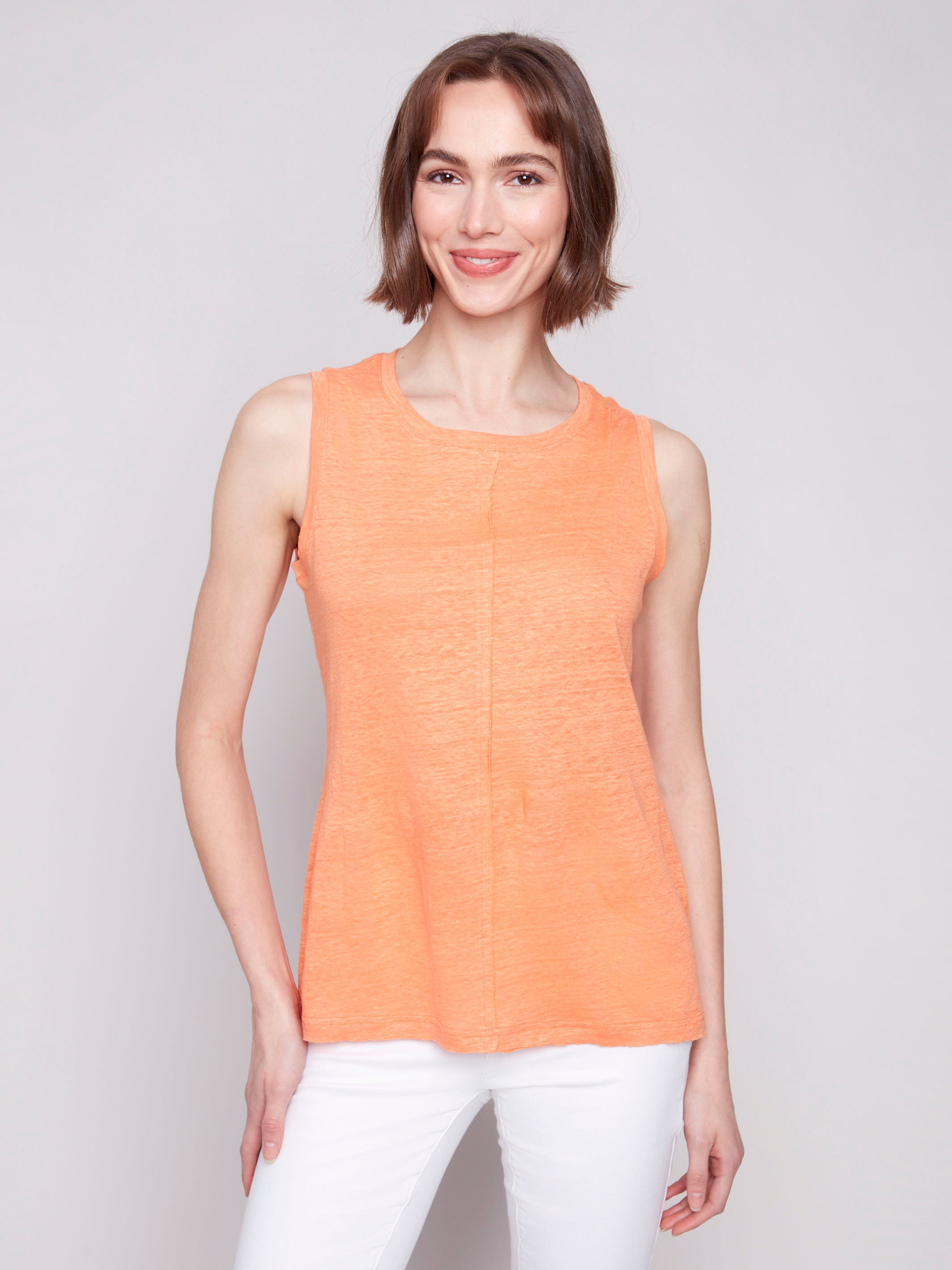 Fashionable sleeveless papaya top crafted in a soft linen blend by Charlie B.