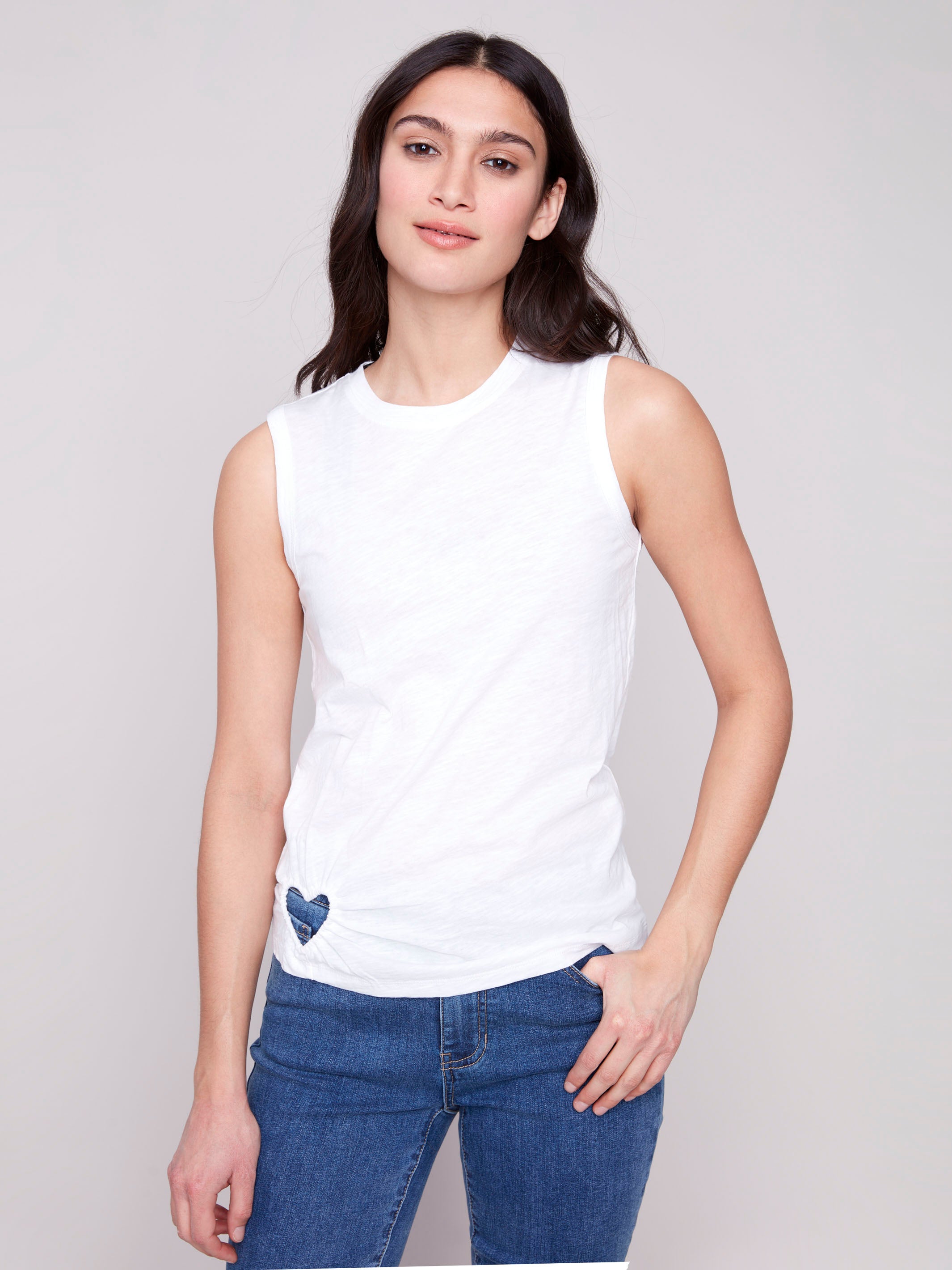 White tank top featuring a crew neckline by Charlie B.