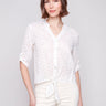 White blouse with eyelet fabric and button-down front by Charlie B.