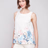 Linen blend top featuring a crew neckline and floral border print by Charlie B.