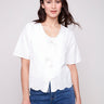 White blouse with scalloped hem and eyelet detailing by Charlie B.