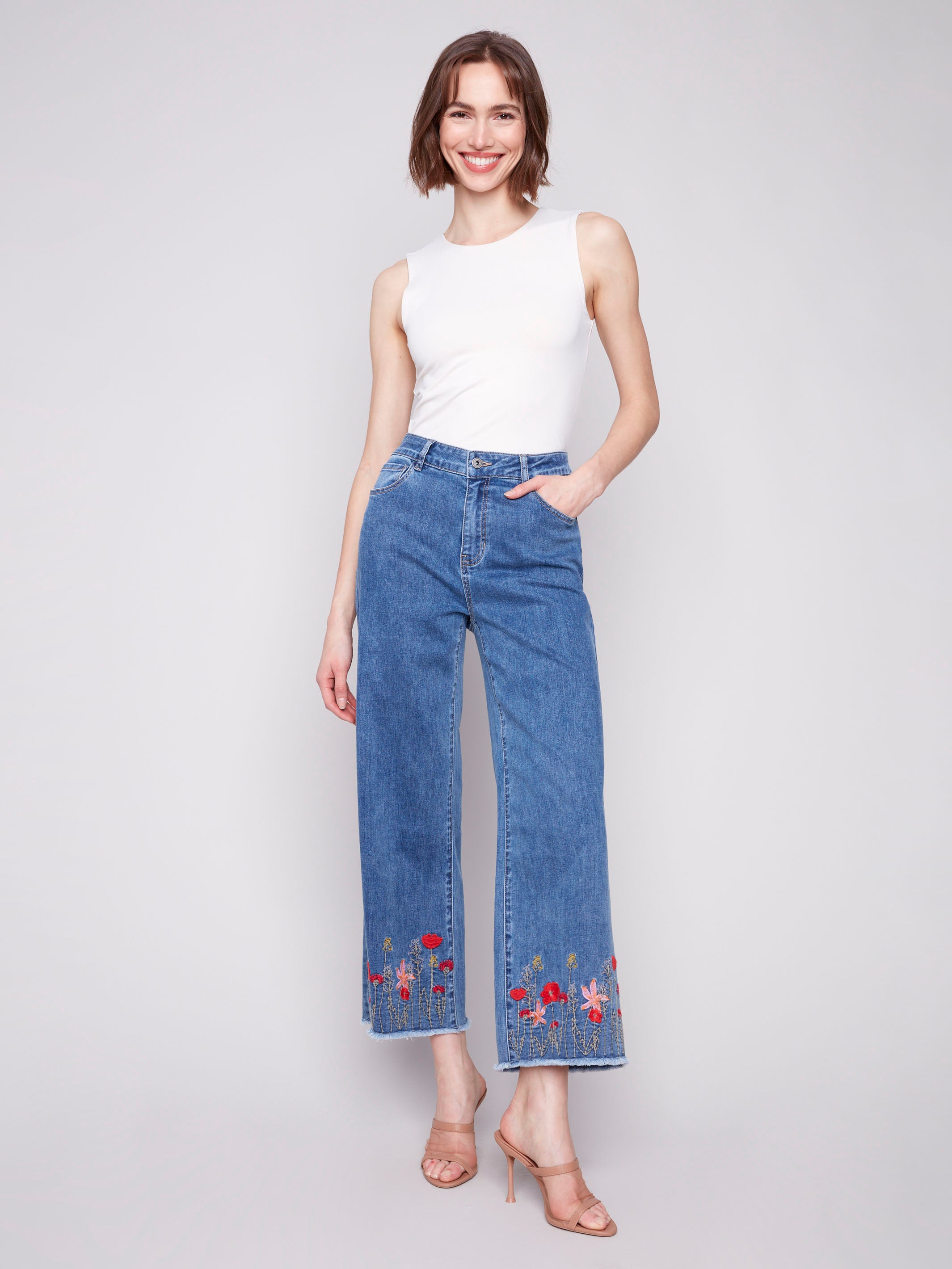 Medium blue jeans with a wide leg fit and stretch denim by Charlie B.