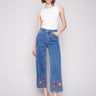 Medium blue jeans with a wide leg fit and stretch denim by Charlie B.