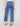 Medium blue jeans showcasing a regular rise waist and wide leg fit by Charlie B.