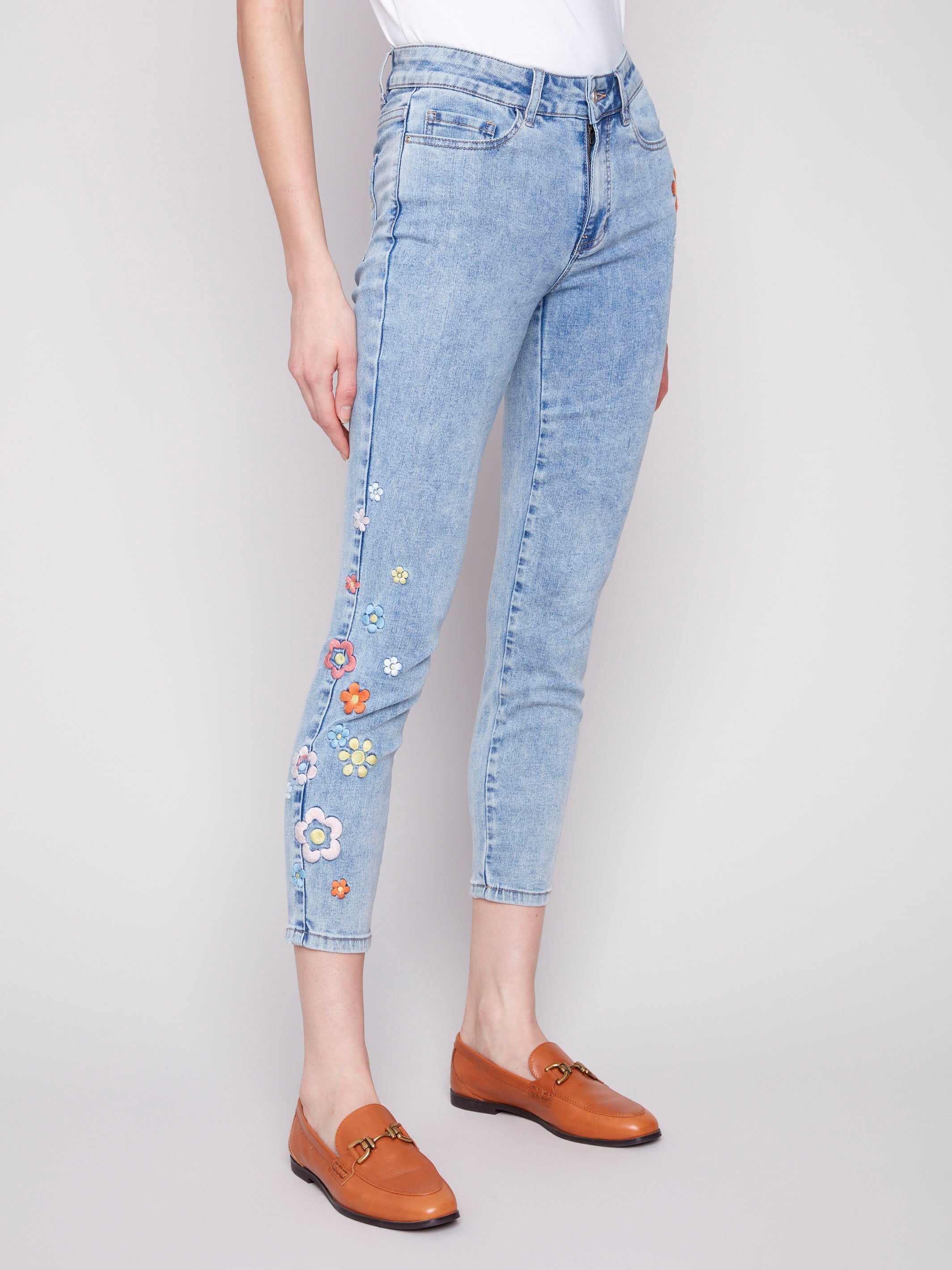 Denim jeans featuring a regular rise waist by Charlie B.