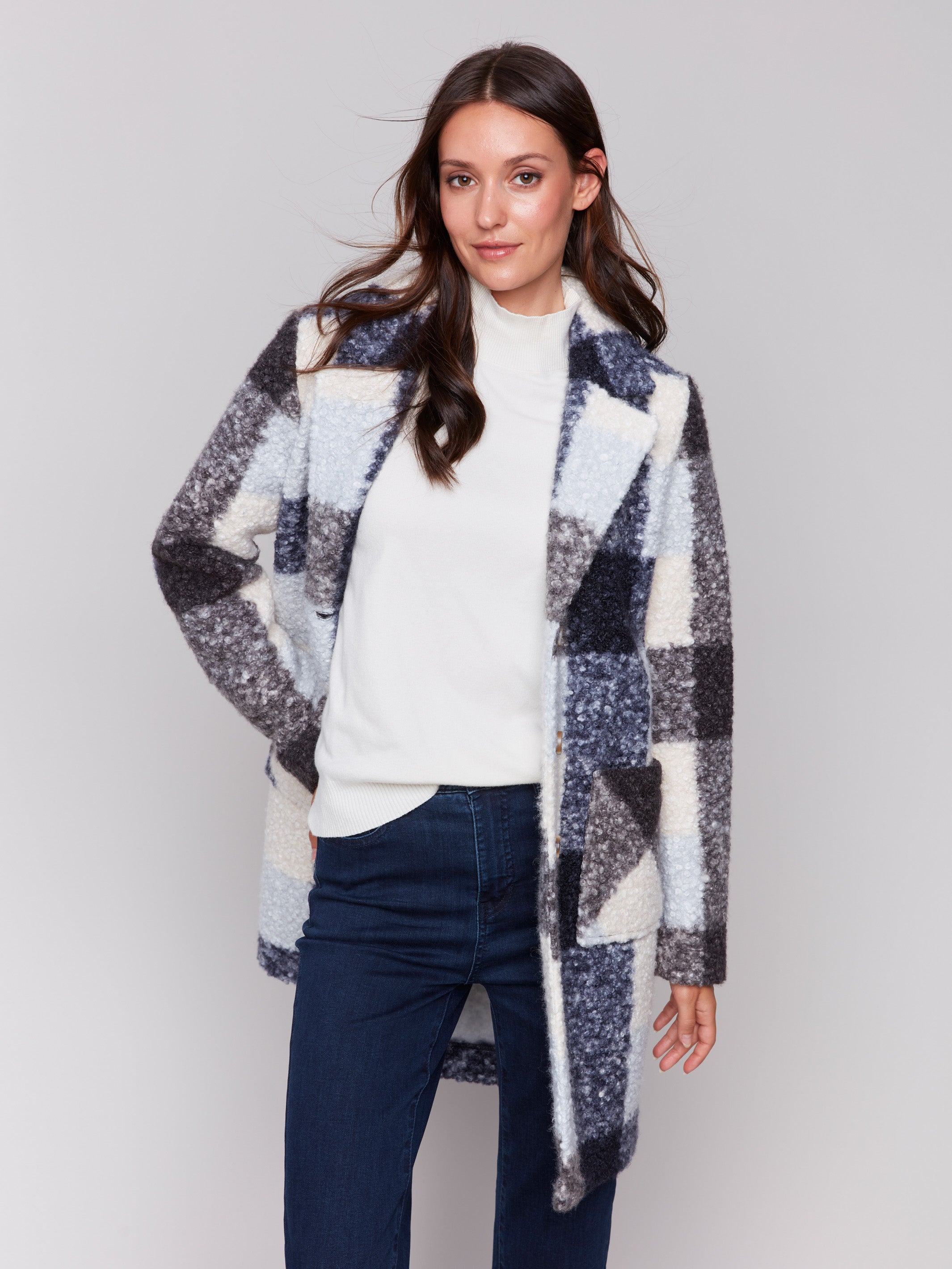 Navy blue plaid bouclé knit coat featuring a tailored collar and patch pockets by Charlie B.