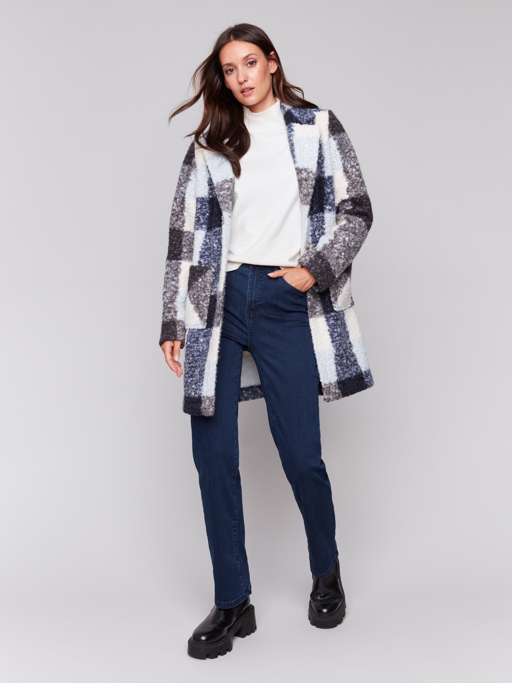 Navy blue plaid bouclé knit coat featuring a tailored collar and patch pockets by Charlie B.