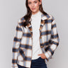 Reversible plaid jacket with button front and patch pockets by Charlie B. Demonstrated in a plaid pattern on each side, in shades of Truffle.