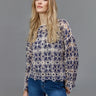 Unique geometric patterns enhance this comfortable 3/4 sleeve top by Charlie B.