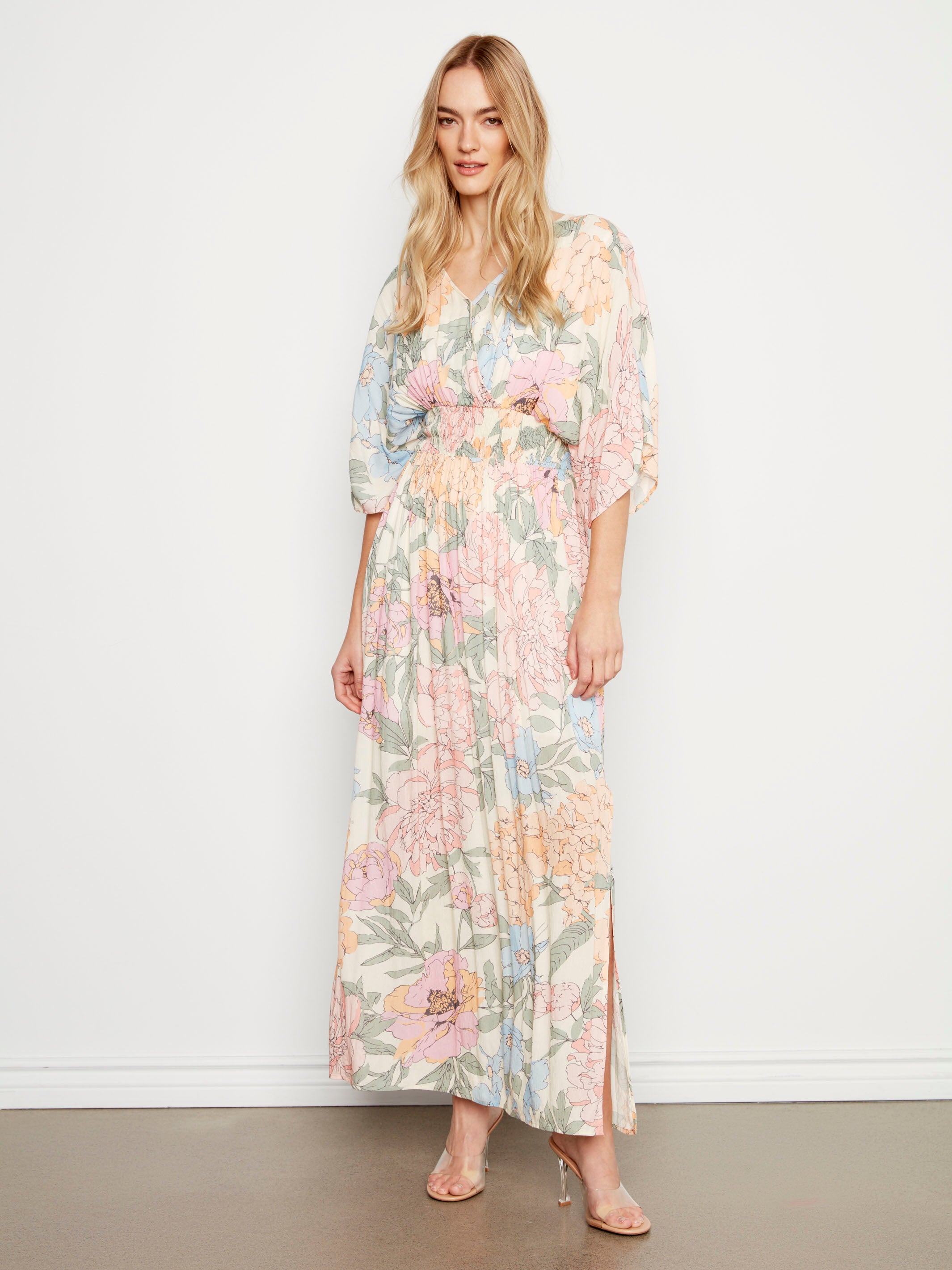 Ankle length dress with a vibrant floral pattern by Charlie B.