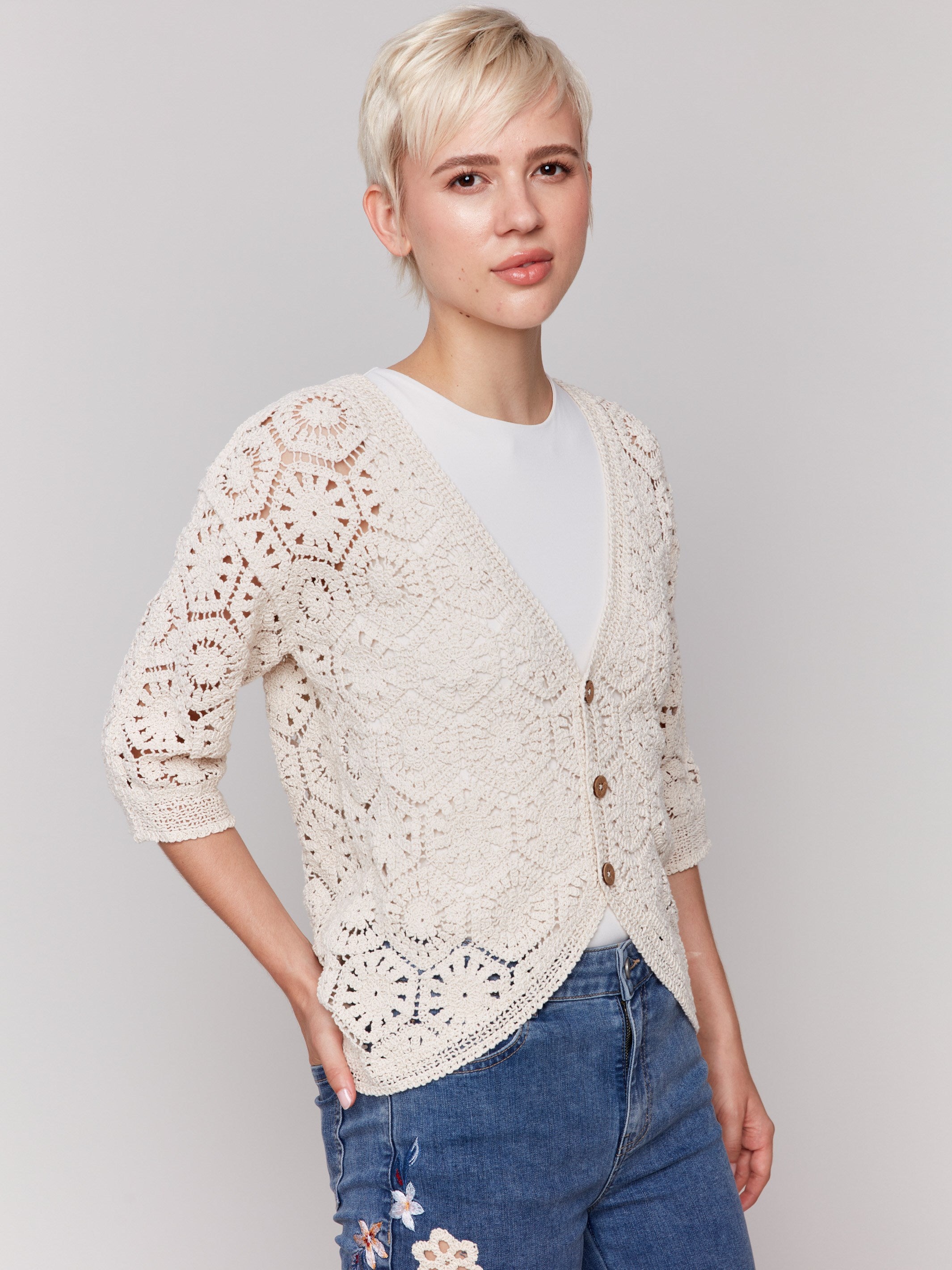 Elegant natural crochet cardigan with a stylish finish by Charlie B.