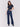 Dark blue bootcut jeans with a five-pocket design and button fly, perfect for casual or dressy occasions by Charlie B.