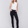 Black bootcut twill pants with an asymmetrical fringe hem and mid-rise waist by Charlie B.