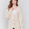 Beige boucle knit cardigan with front button closure and ribbed cuffs by Charlie B.