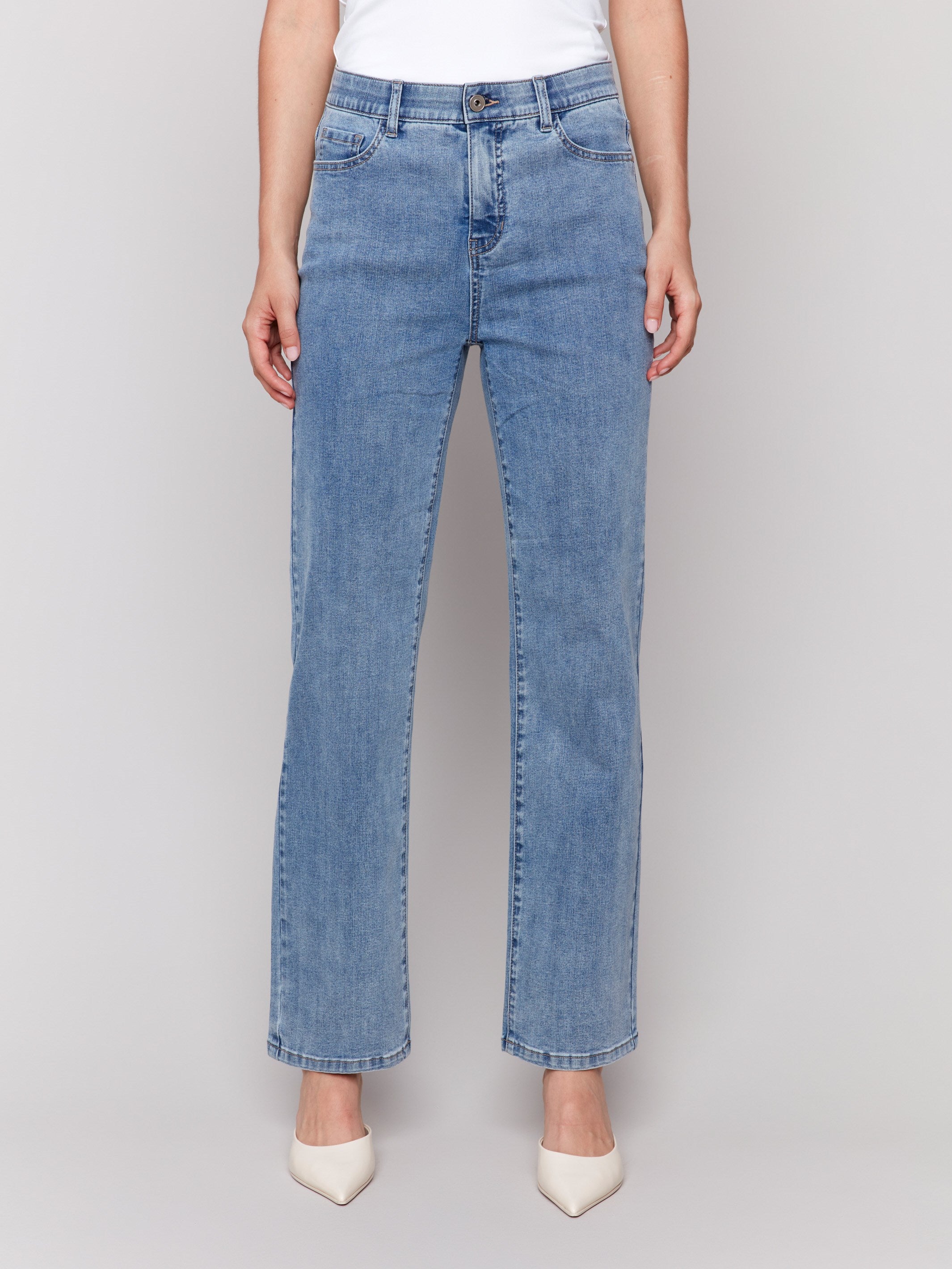 Light blue straight-leg jeans with classic five-pocket design and elastic waistband by Charlie B.