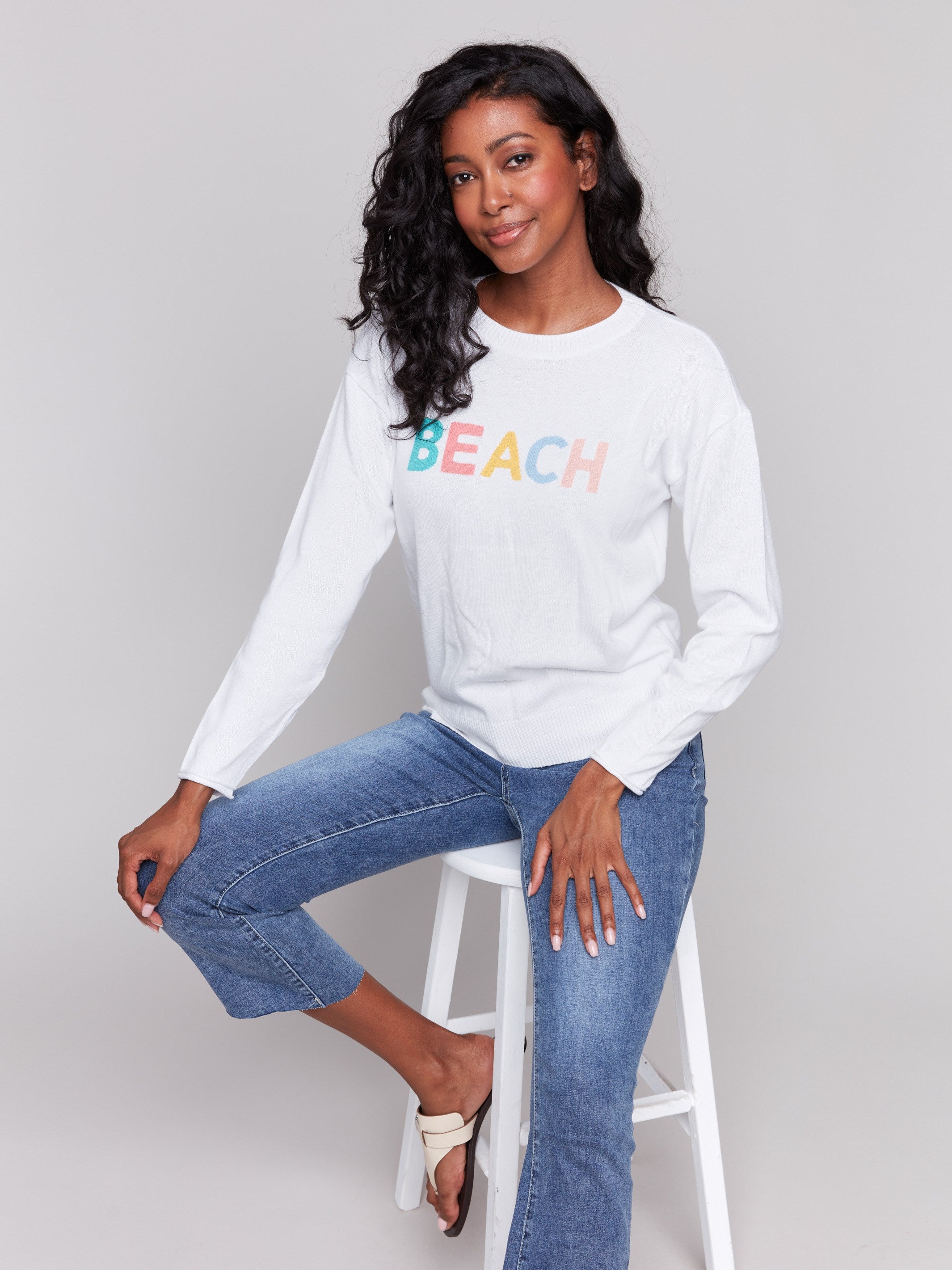 Long-sleeve knit sweater with unique beach-inspired print by Charlie B.