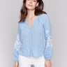 Chambray blouse featuring a stylish V-neck design by Charlie B.