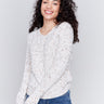 Cream nep yarn sweater with flecks and a V-neck by Charlie B, ideal for layering.