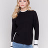 Black crew neck sweater with white accents and side slit, long sleeves, ideal for a casual look by Charlie B.