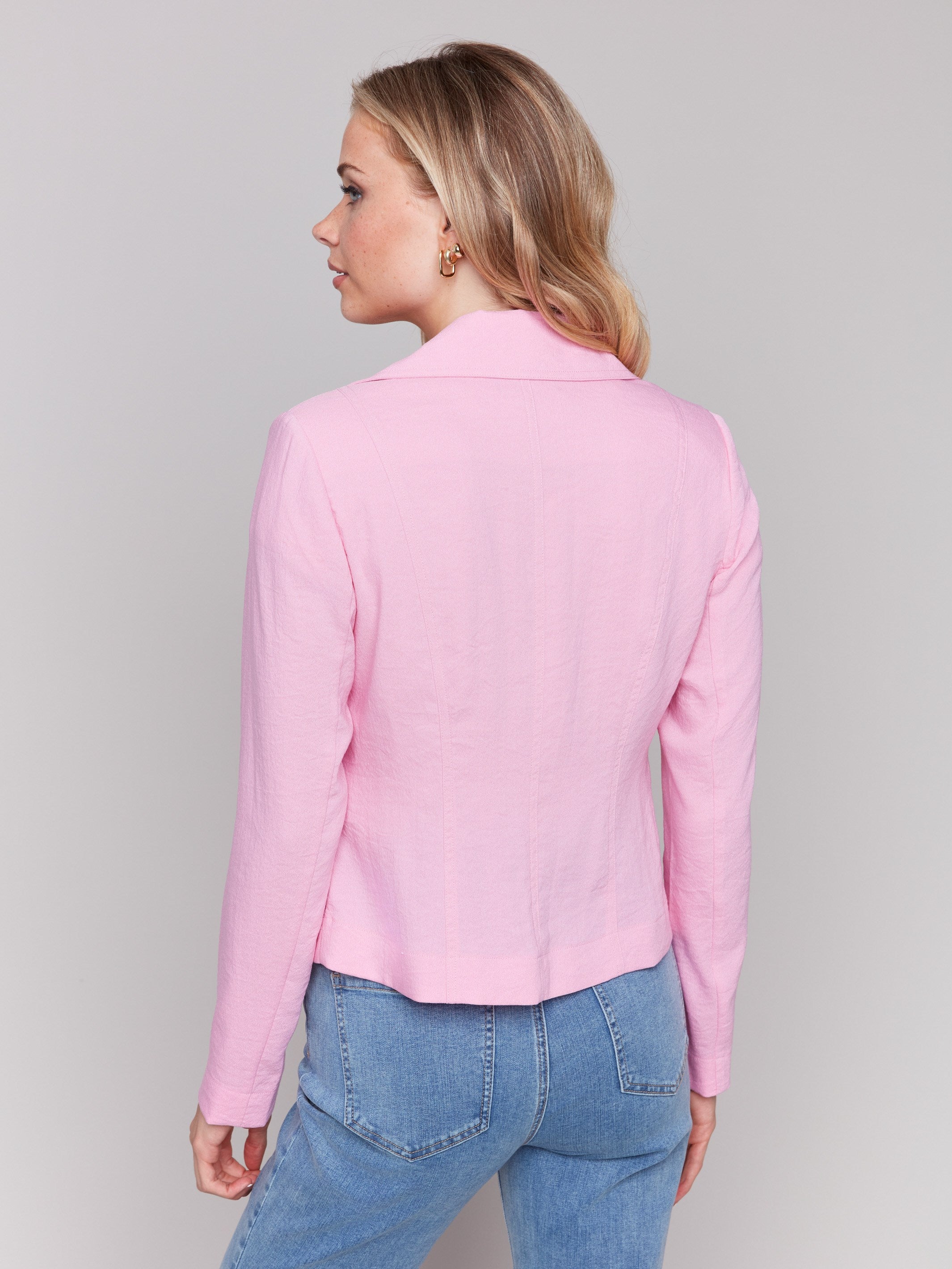 Chic hook-and-eye closure on pink biker jacket by Charlie B.