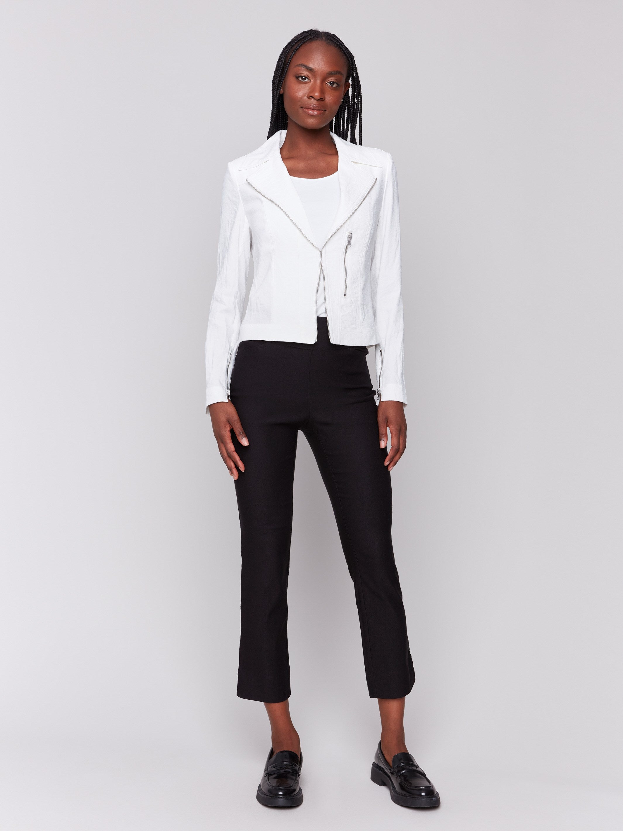 White jacket featuring a short length and stylish design by Charlie B.