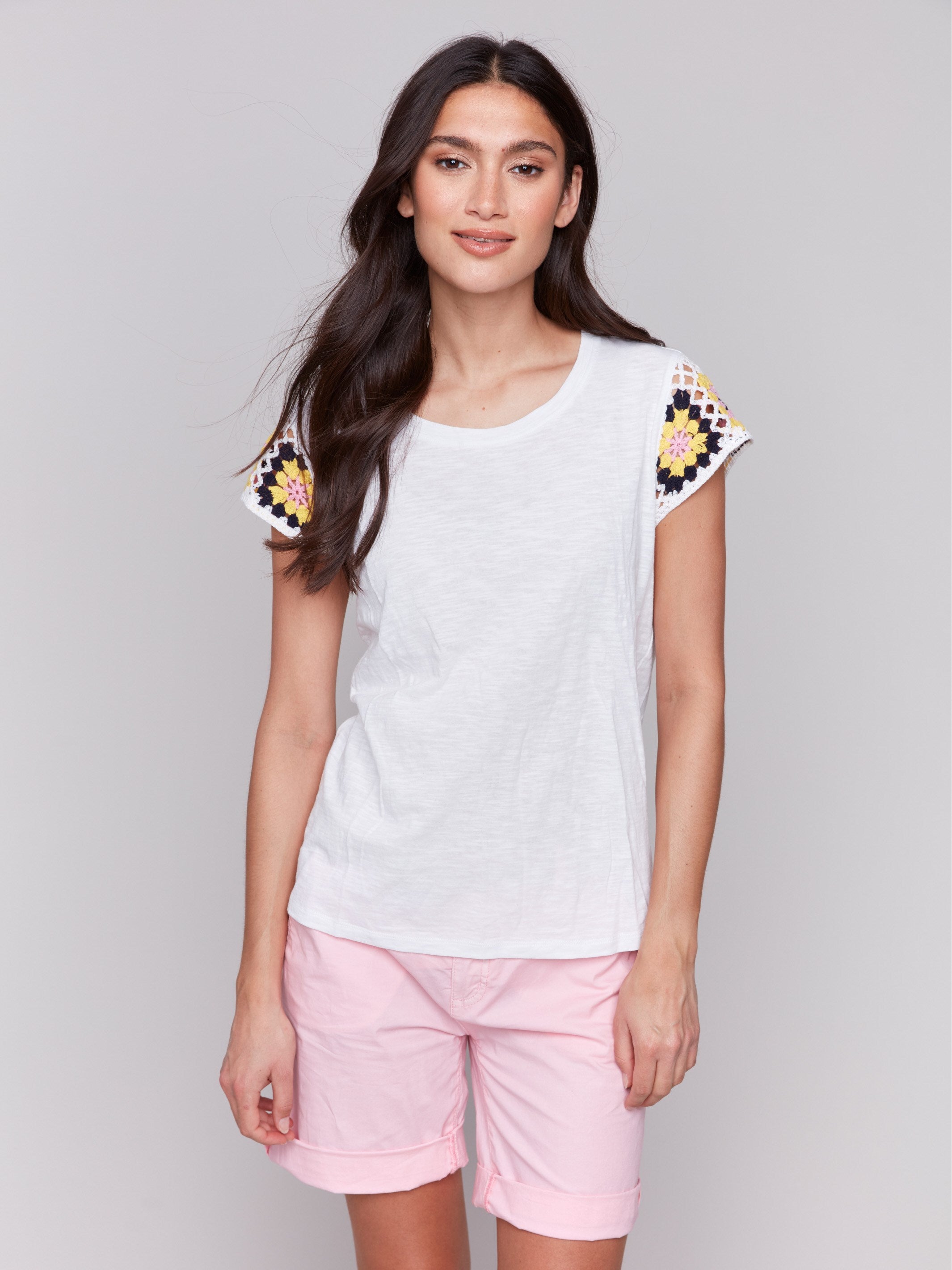 Cotton t-shirt featuring crochet cap sleeves by Charlie B.