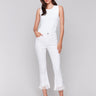 White cropped jeans with fringed hem, regular rise and bootcut leg design by Charlie B.