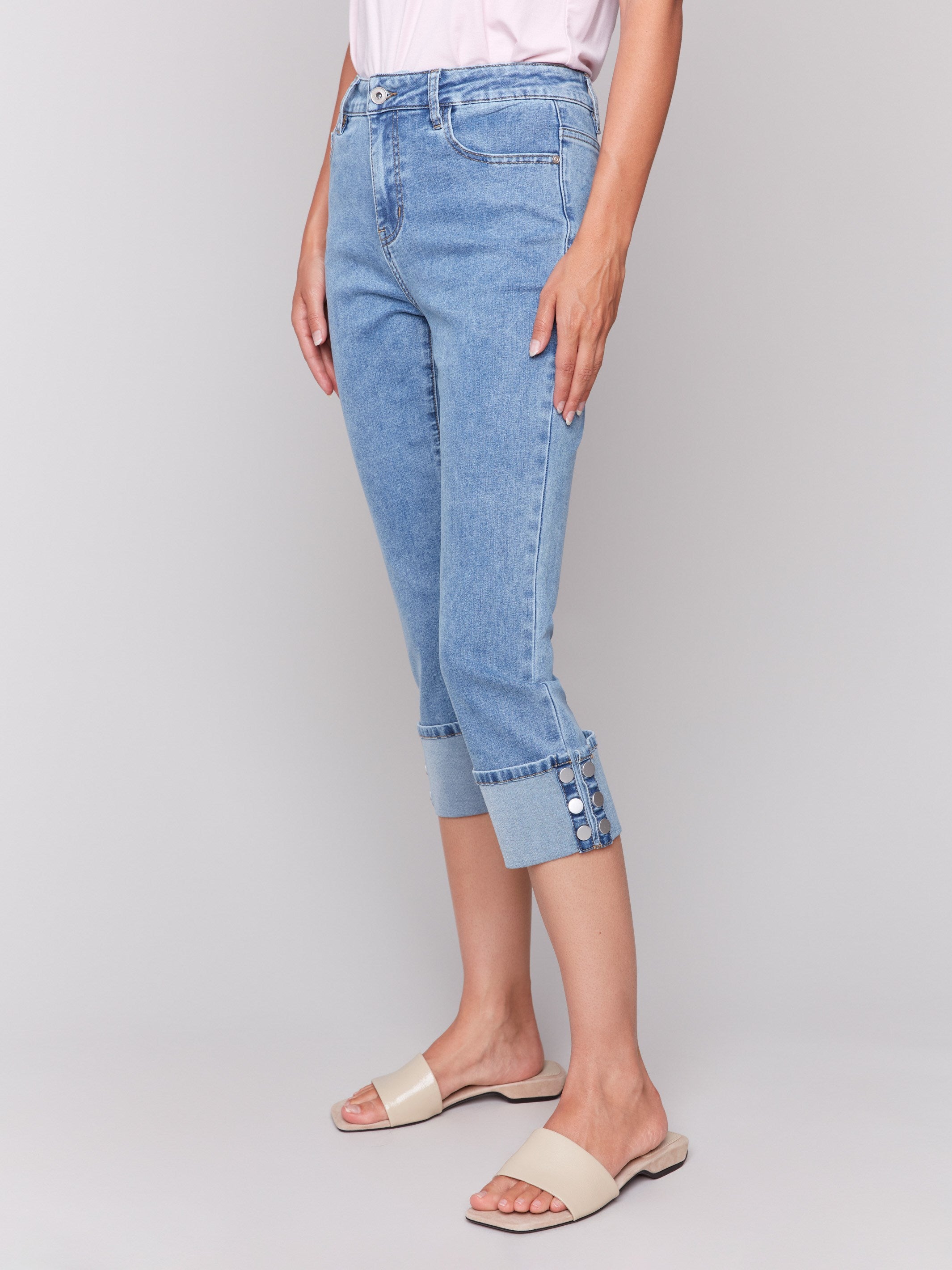 Jeans with snap button detail at hem and regular rise waist by Charlie B.