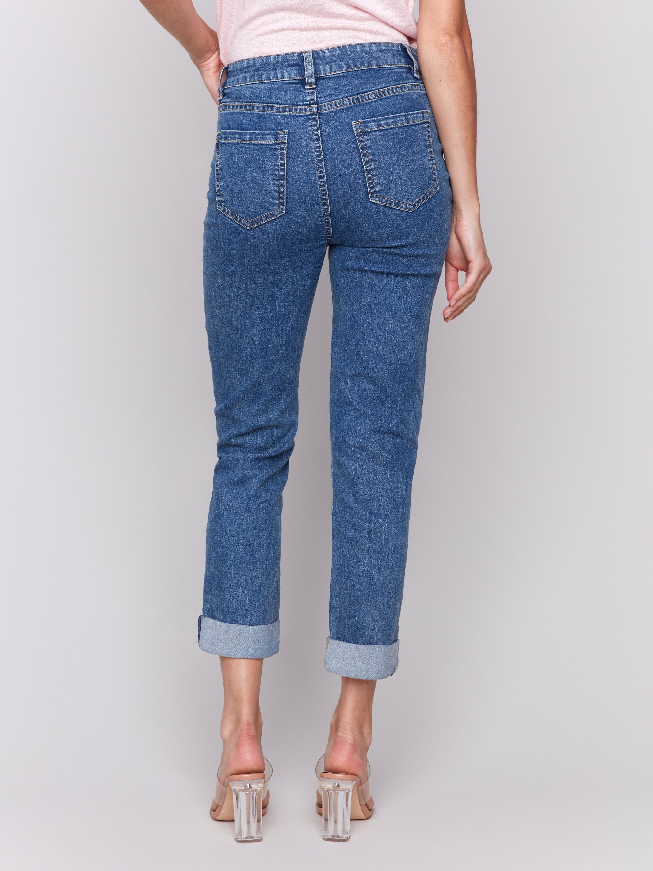 Medium blue cuffed hem jeans with front pintuck detailing by Charlie B.