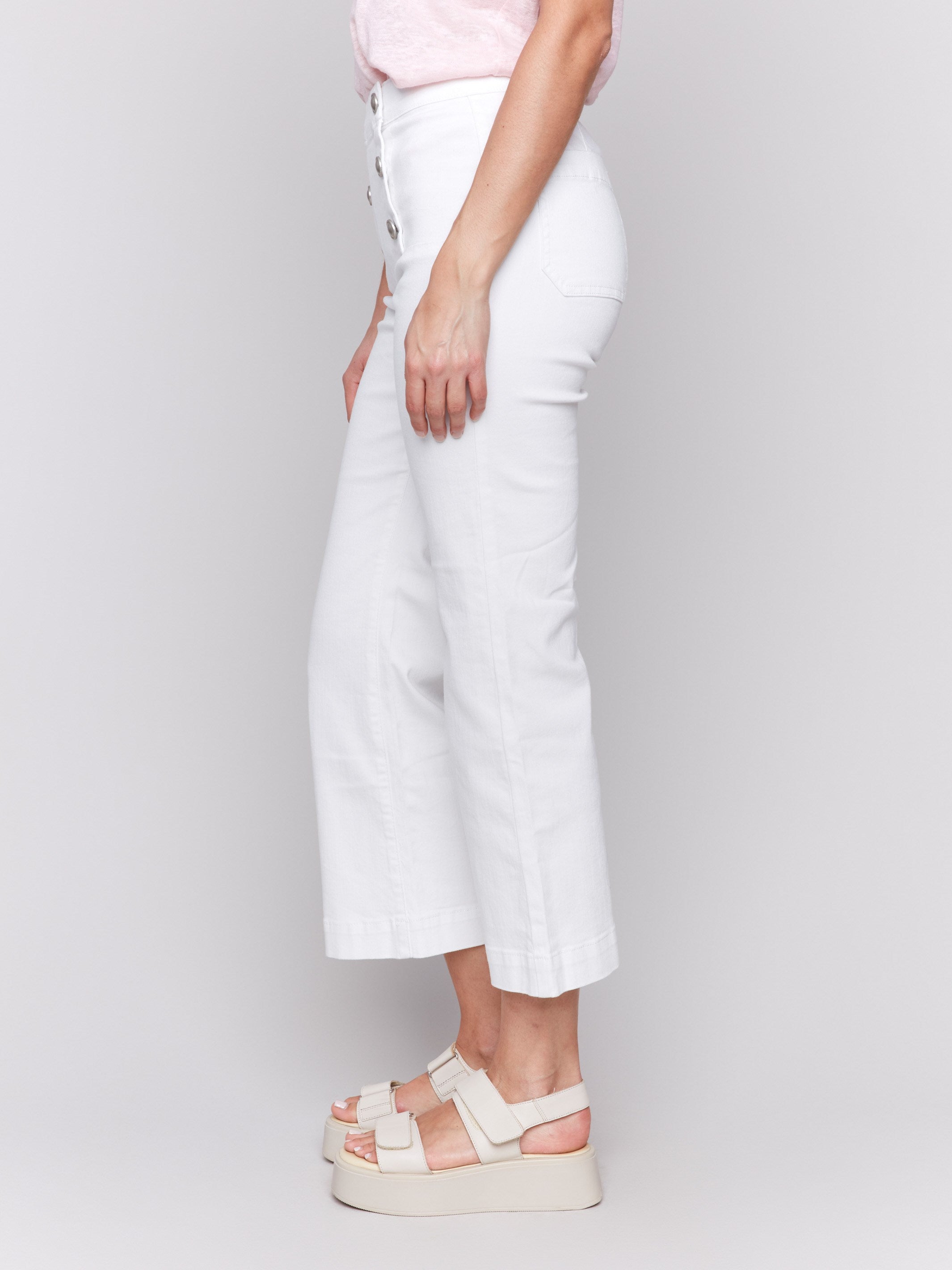 Jeans featuring a pull-on style in white by Charlie B.