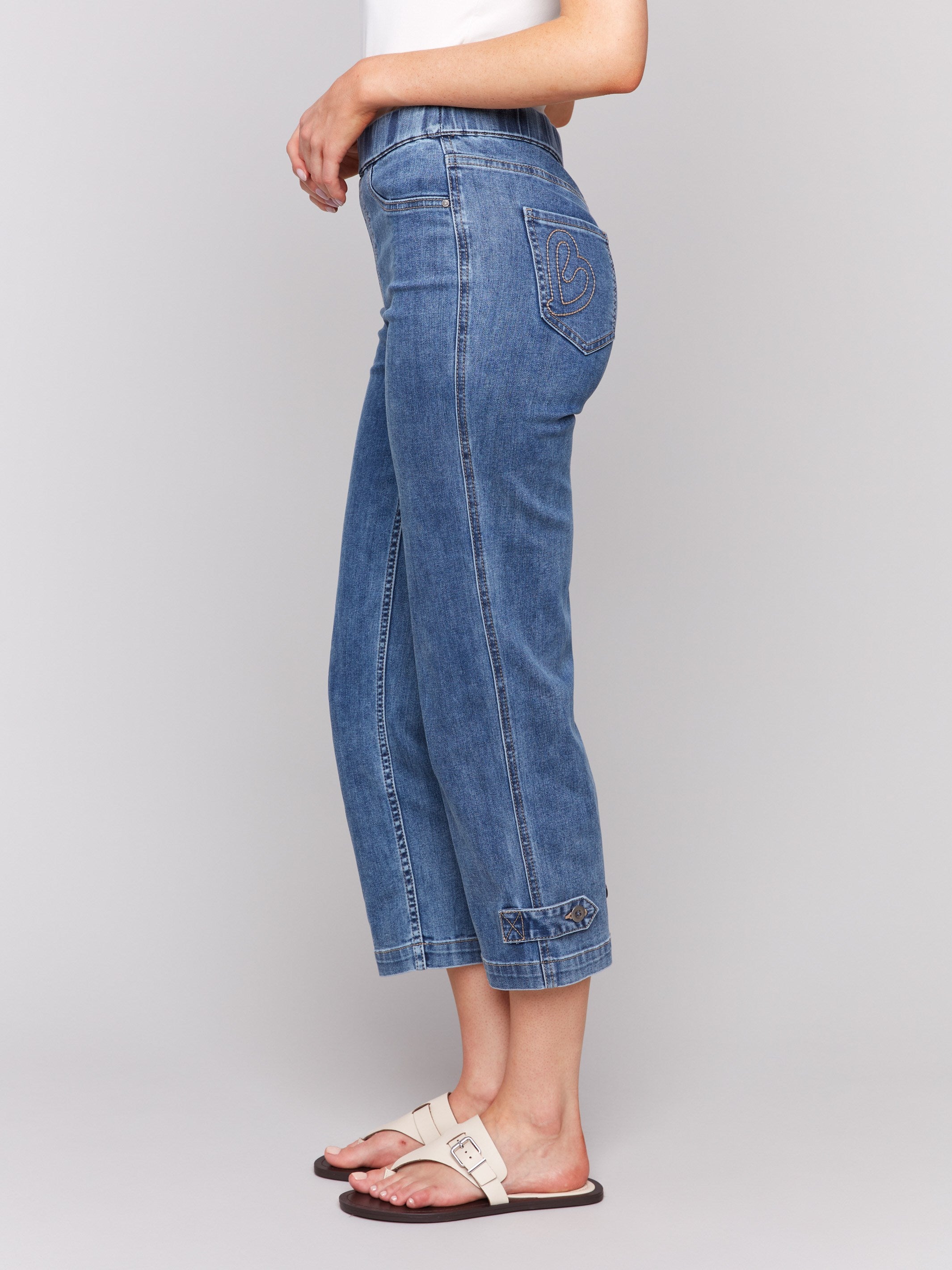 Cropped length jeans with a stylish buttoned hem tab detail by Charlie B.