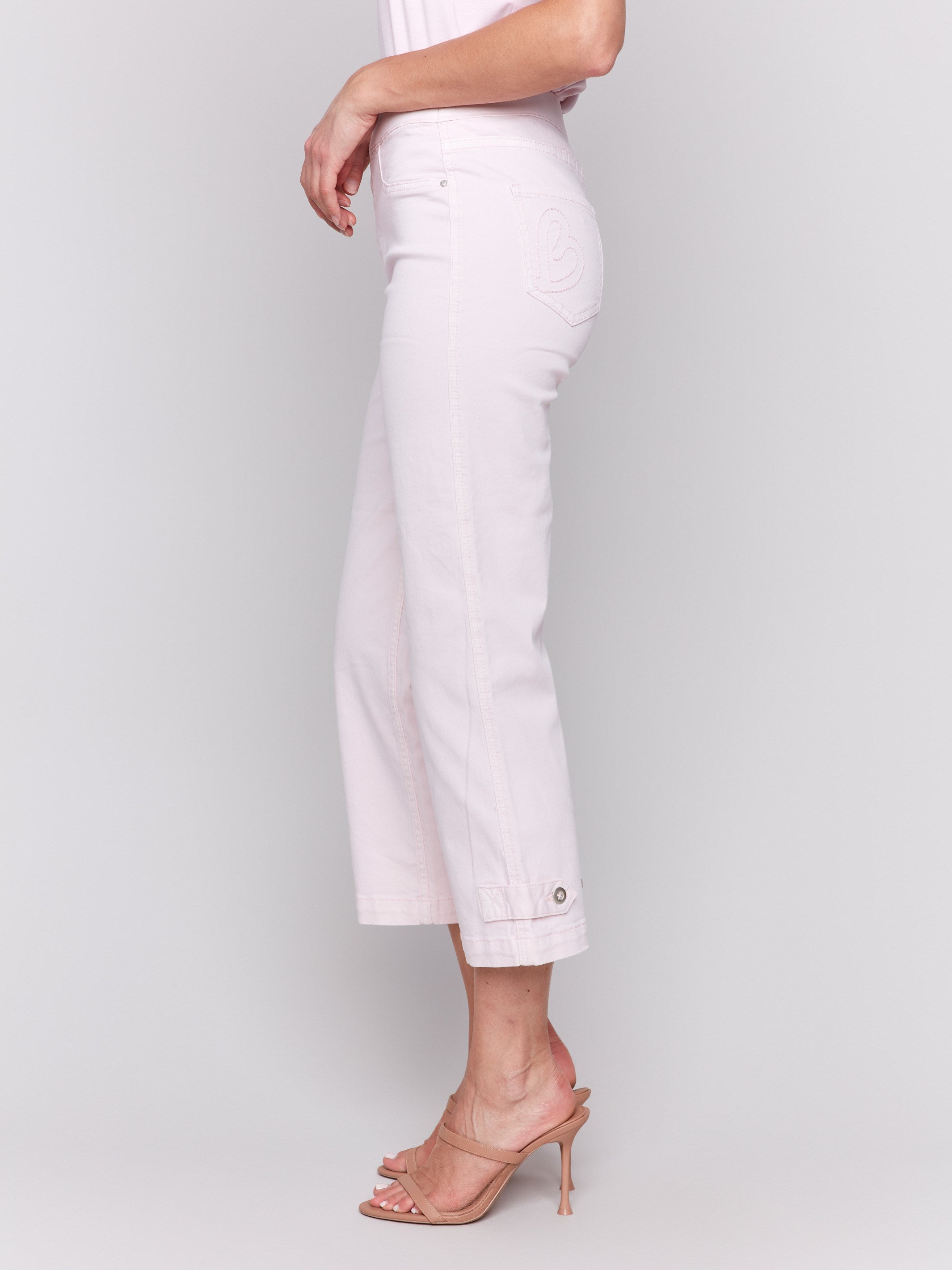 Pull-on style pink pants with a regular rise waist, created by Charlie B.