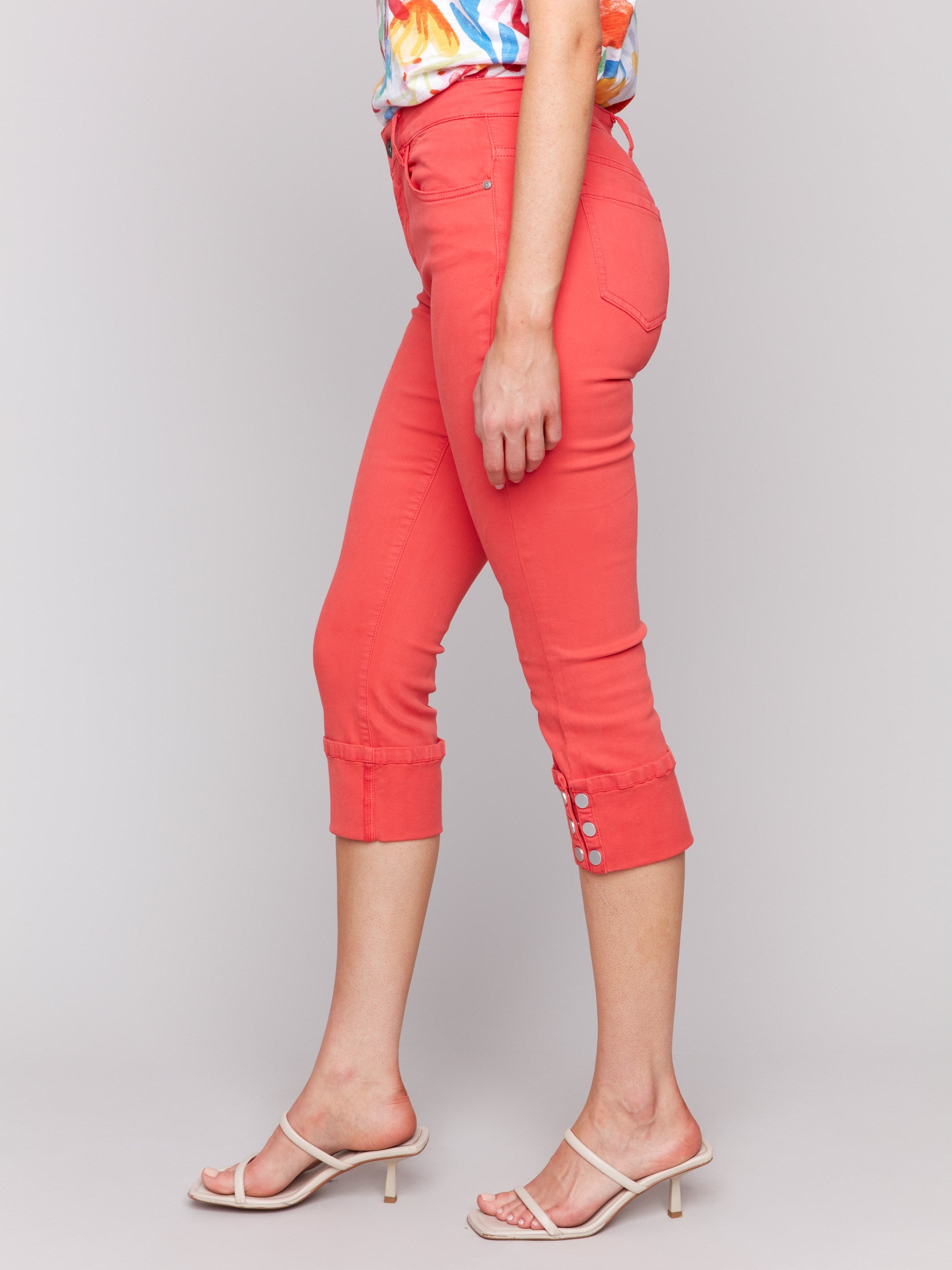 Stylish five-pocket design on these fiesta-colored cropped jeans adds functionality by Charlie B.