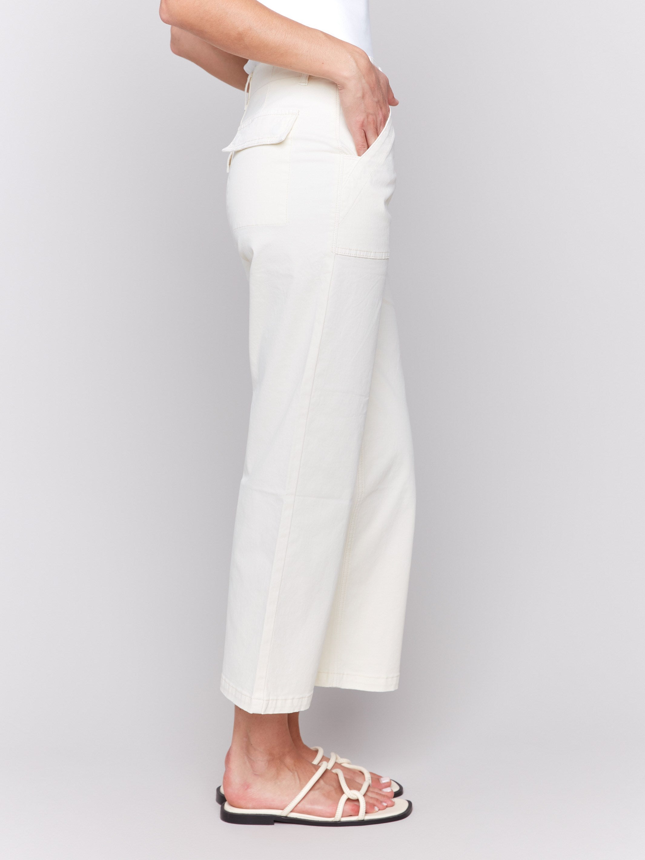 Natural-colored pants with regular rise and stretch twill fabric by Charlie B.