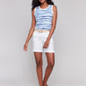 White shorts featuring a regular rise and rolled cuffs by Charlie B.