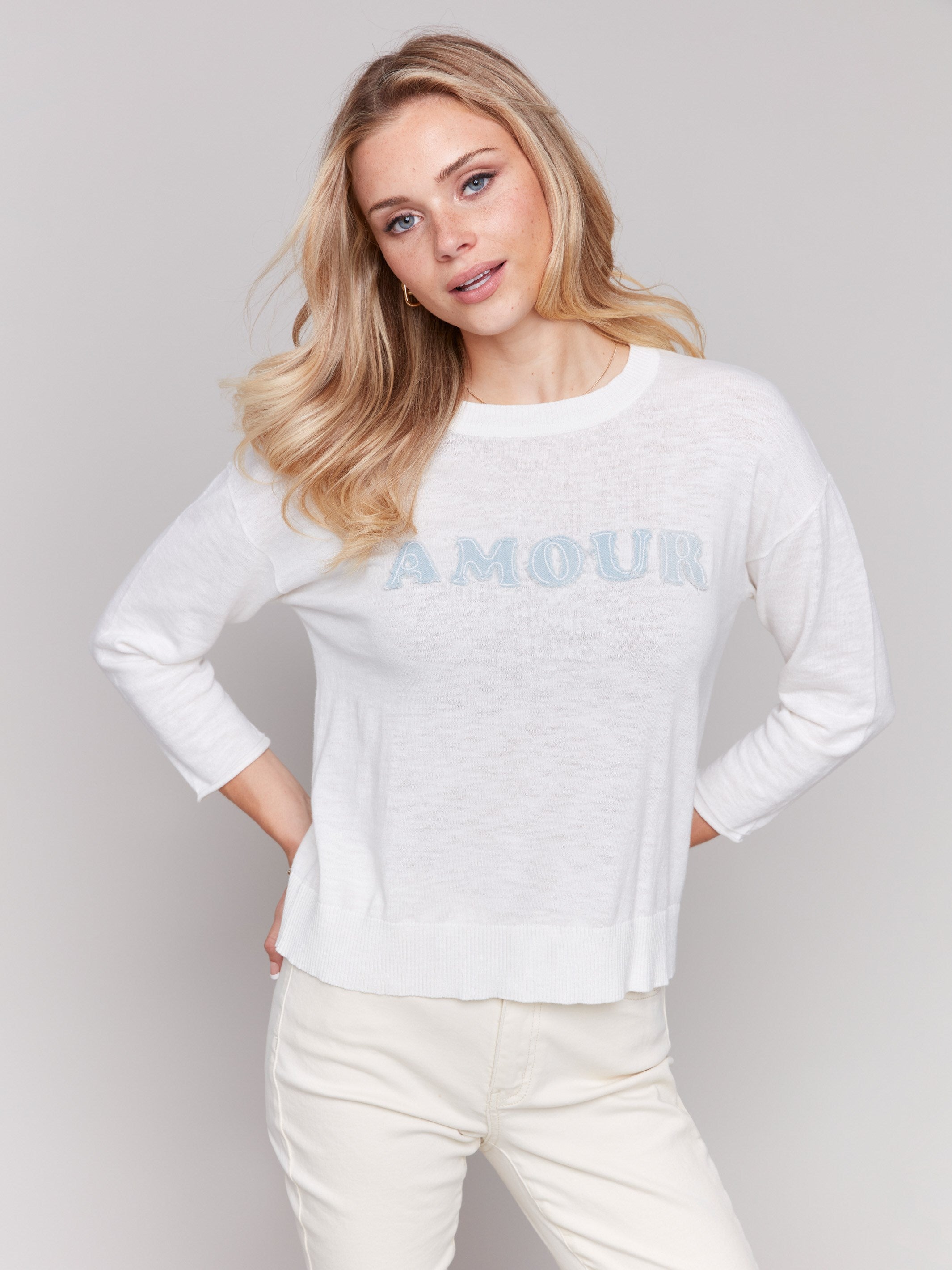 White cotton sweater with denim 'Amour' patch and crew neck by Charlie B.