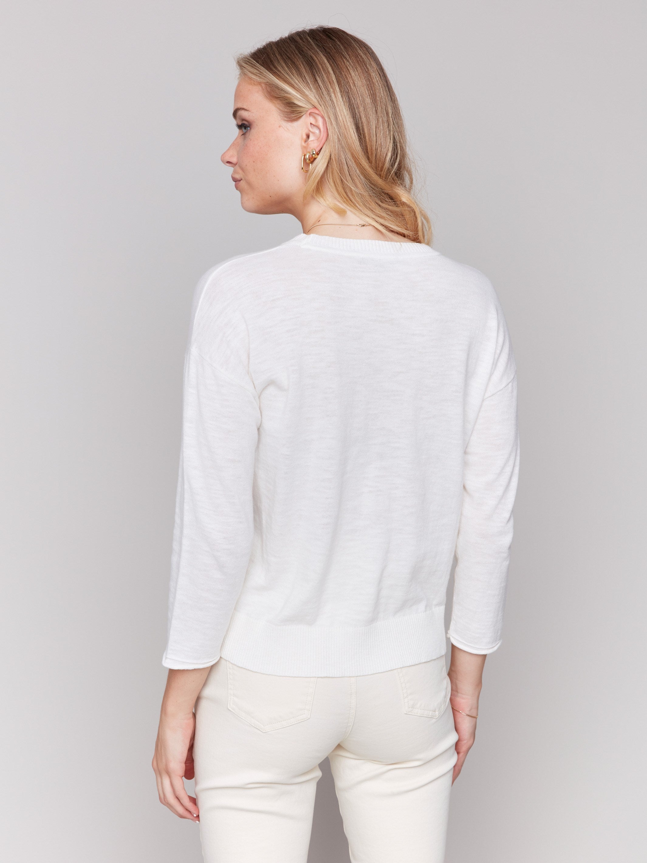 White cotton sweater with denim 'Amour' patch and crew neck by Charlie B.