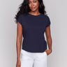 Navy T-shirt with a crew neckline and lace shoulder detail by Charlie B.