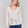 Beige cotton sweater with V-neck design by Charlie B.