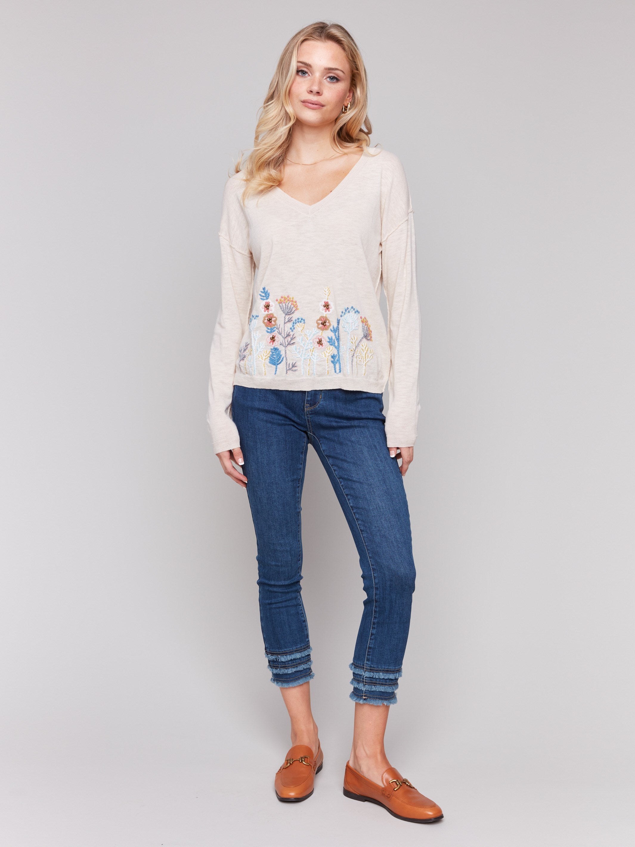 Elegant beige sweater crafted in cotton by Charlie B.