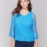 Lagoon blue fishnet crochet sweater with a relaxed V-neck by Charlie B.