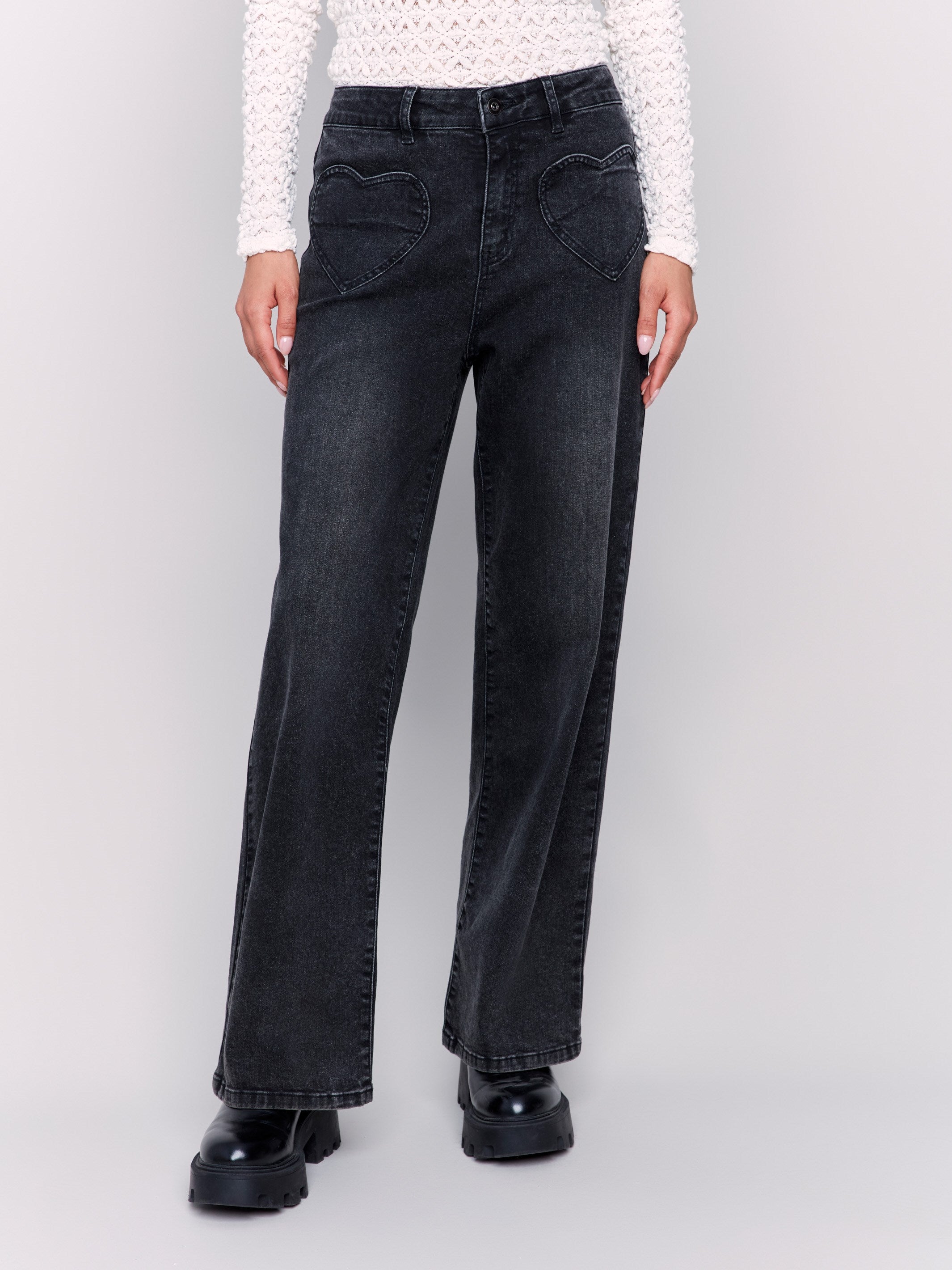 Charcoal-colored flare jeans with heart-shaped front pockets, regular rise, and flare leg by Charlie B.