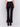 Woman wearing black flare ponte pants with side slits by Charlie B.