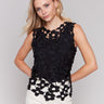 Black crochet top featuring a crew neckline by Charlie B.