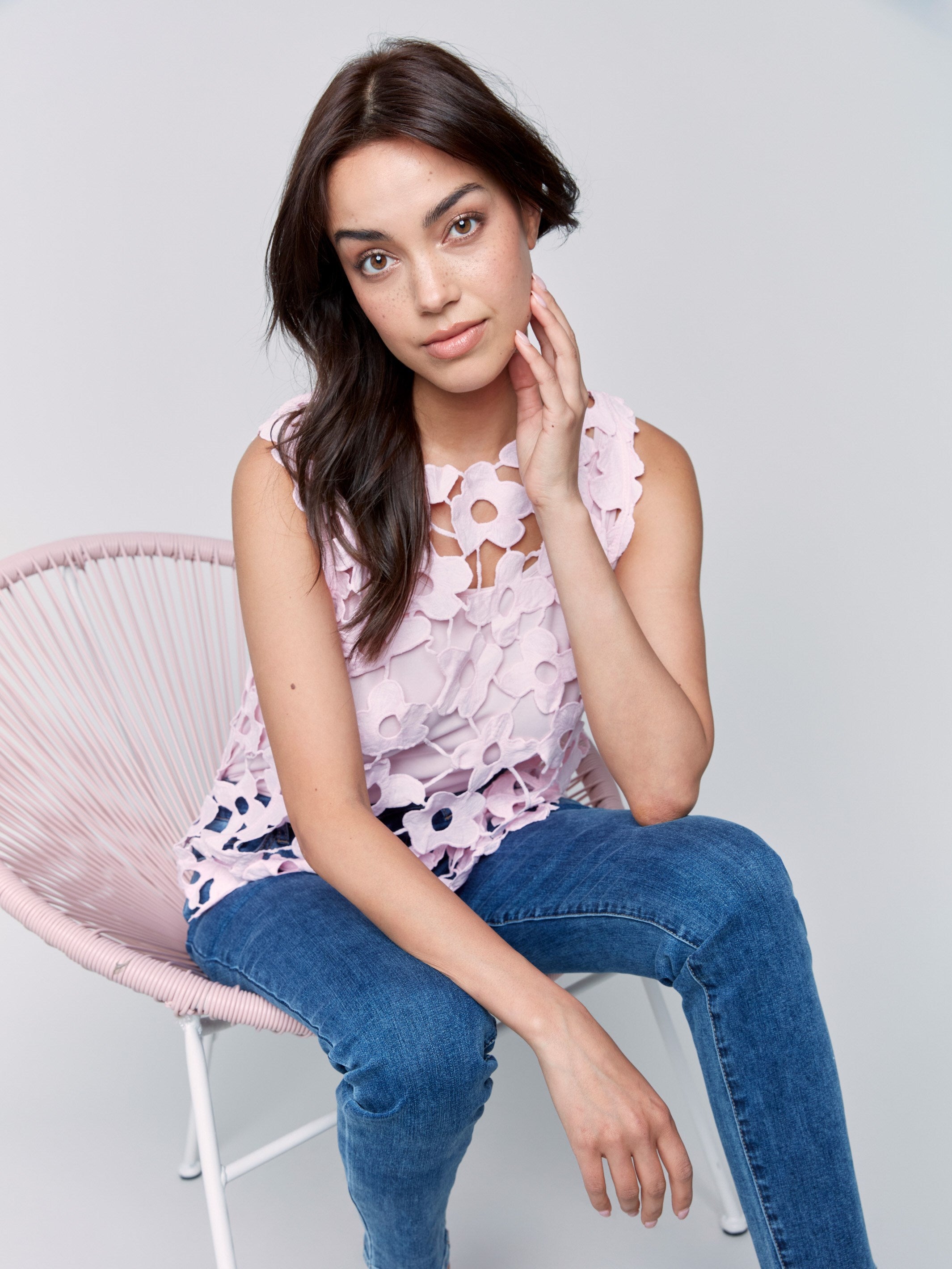 Elegant pink crochet top with a delicate crew neckline by Charlie B.