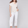 Cropped length white pants with stretch twill fabric by Charlie B.