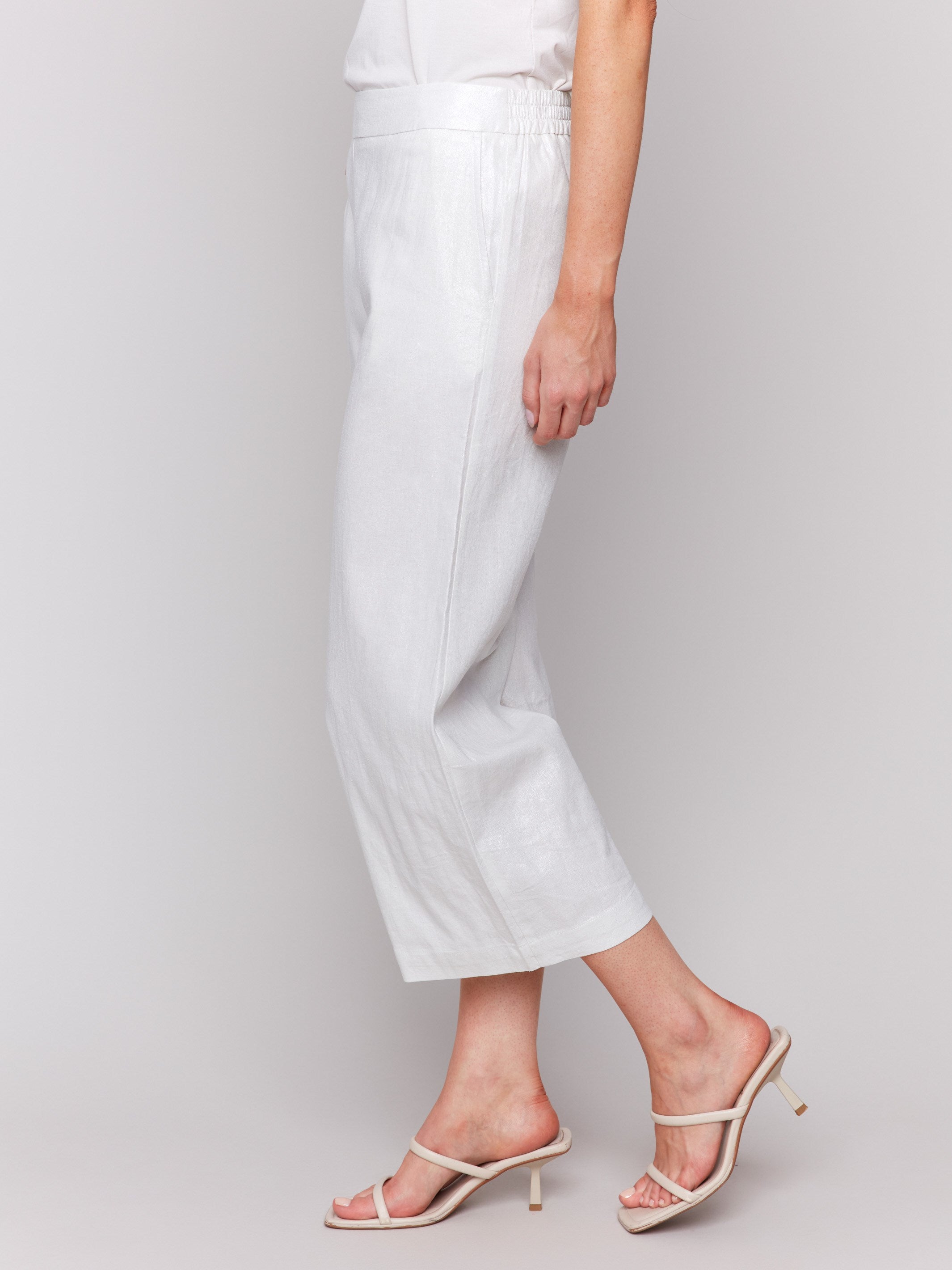 Cropped length pants in champagne color with wide leg by Charlie B.