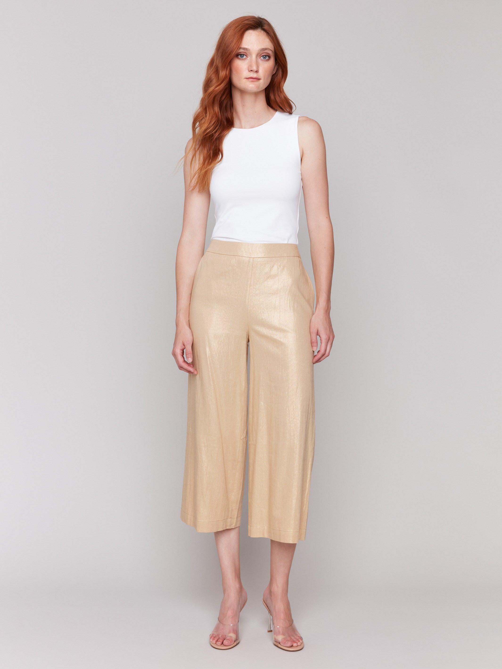 High-rise waist enhances the fit of these gold wide leg pants by Charlie B.