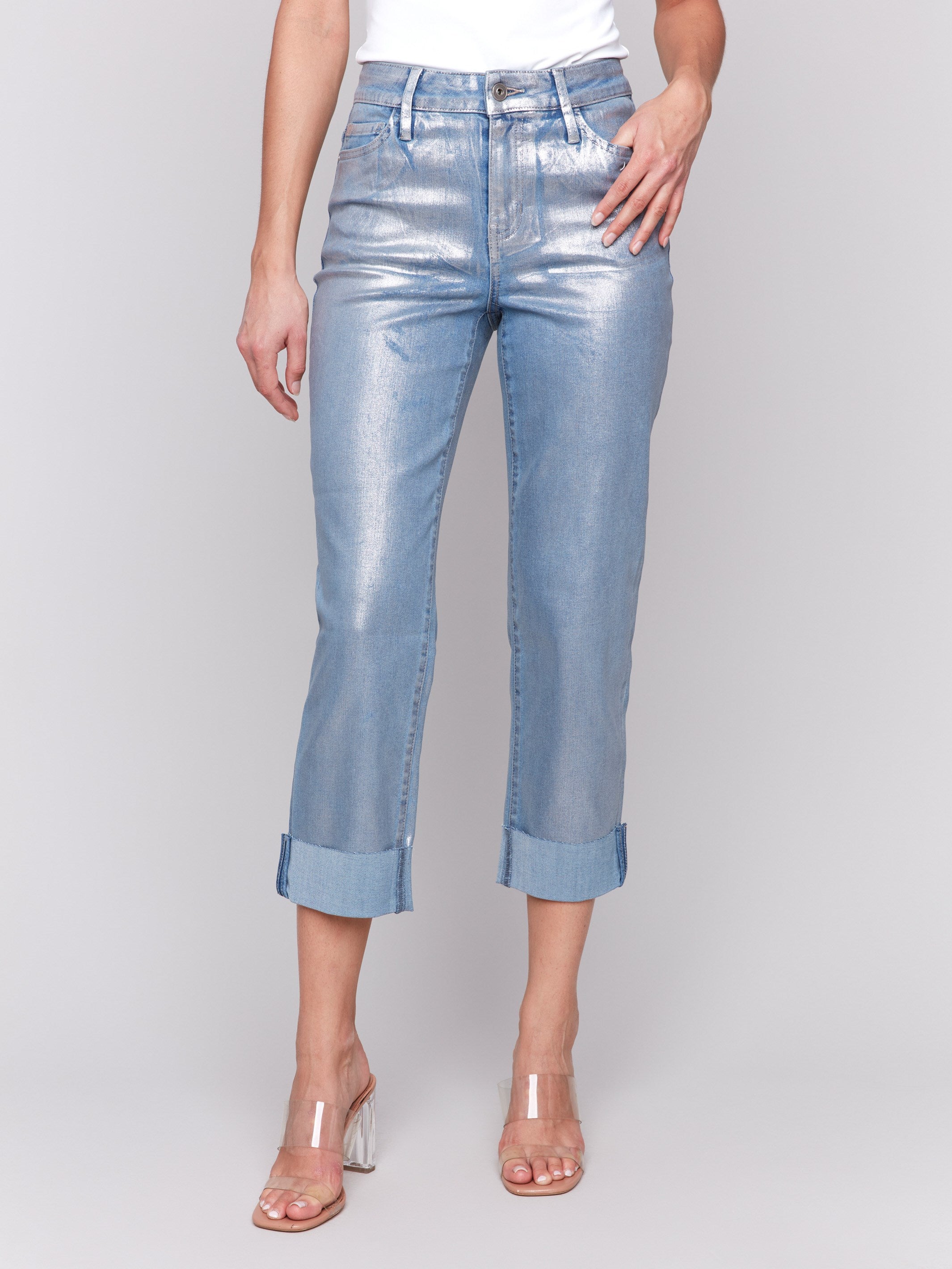 Cropped length bleach blue pants with a stylish foil finish by Charlie B.